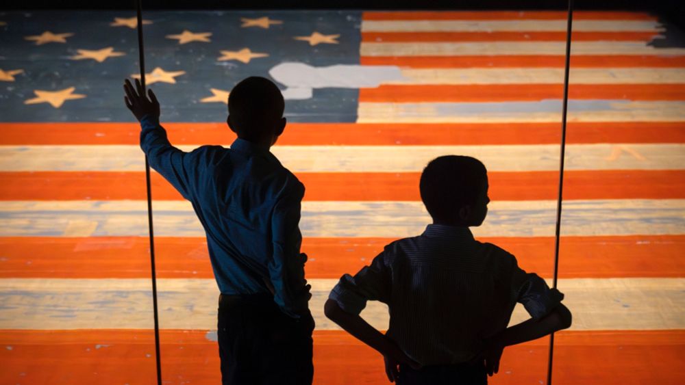 The Smithsonian says a reference to President Trump's impeachments that was removed last month will be restored once the exhibit is updated.