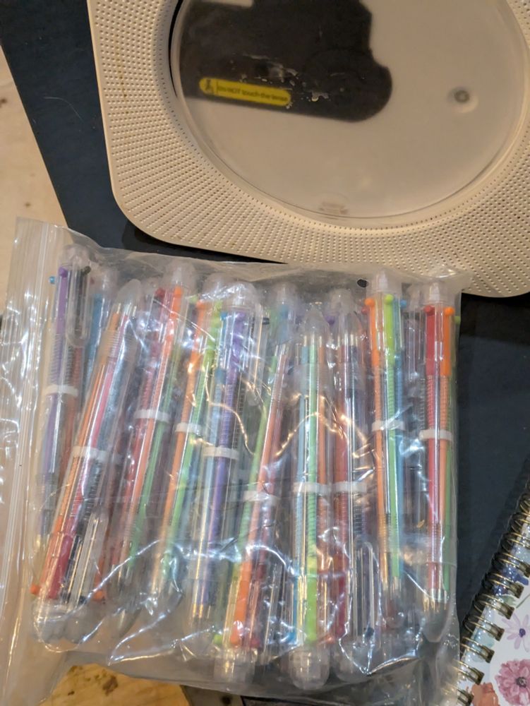 Set of pens with multiple colors of ink 