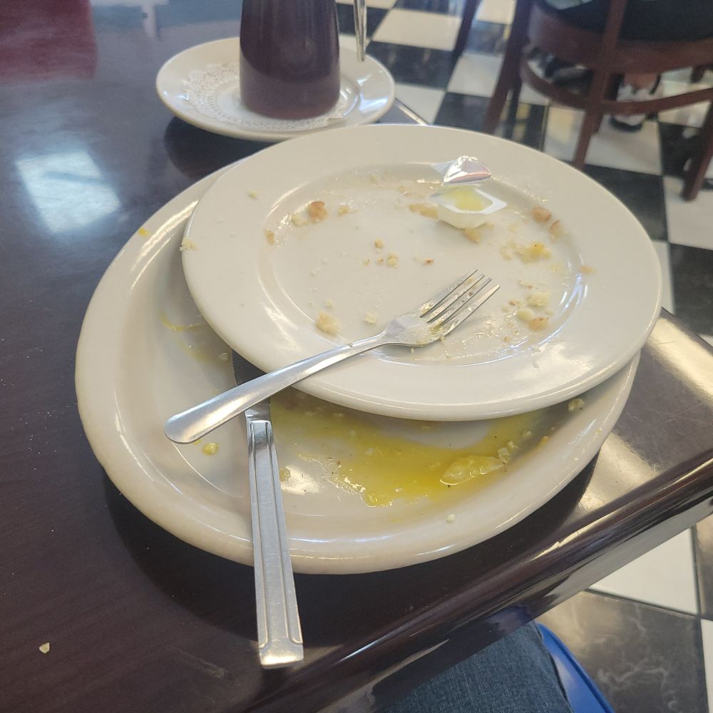 Two food stained plates