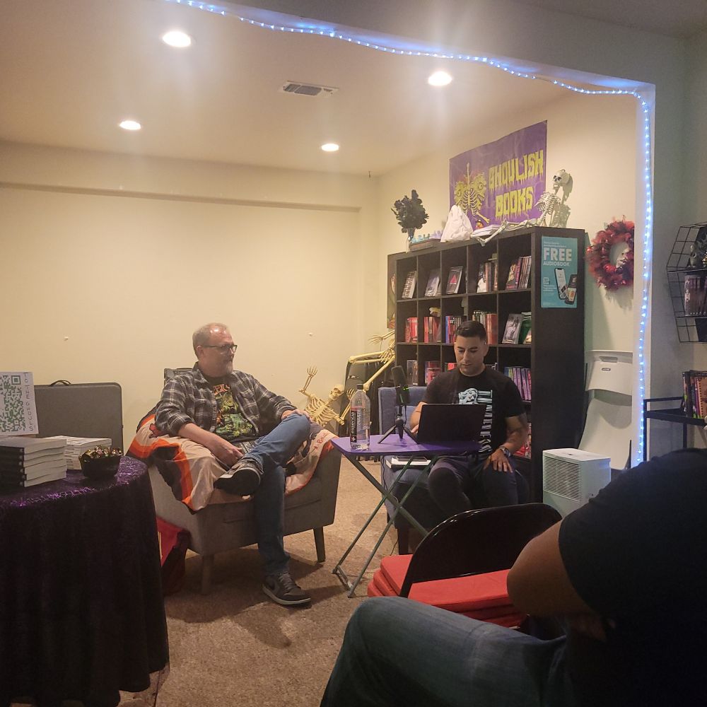 Josh Rountree being interviewed for Dog Eared Nightmares podcast at Ghoulish Books