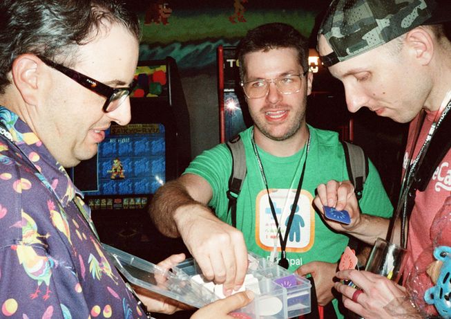 Lickability's own Tom handing out stickers, pins and Lickability swag.
