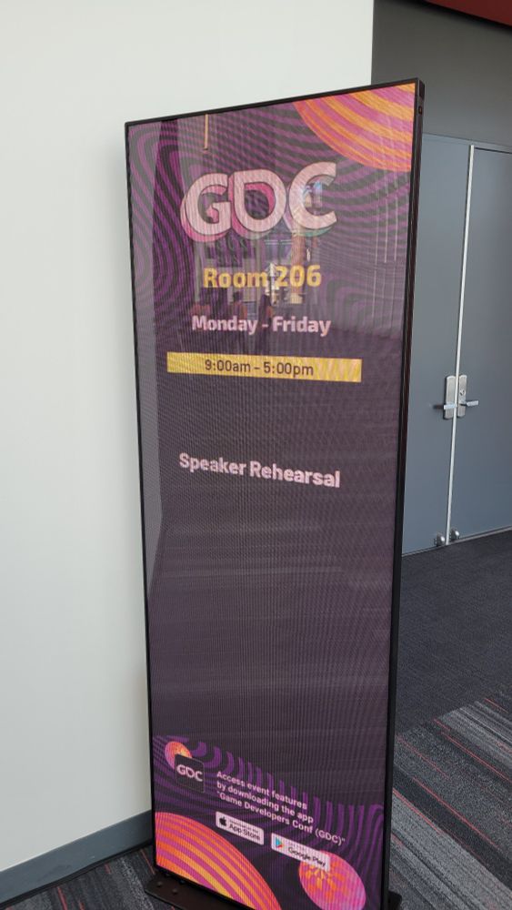 Digital sign that indicates the room is for GDC speaker rehearsal