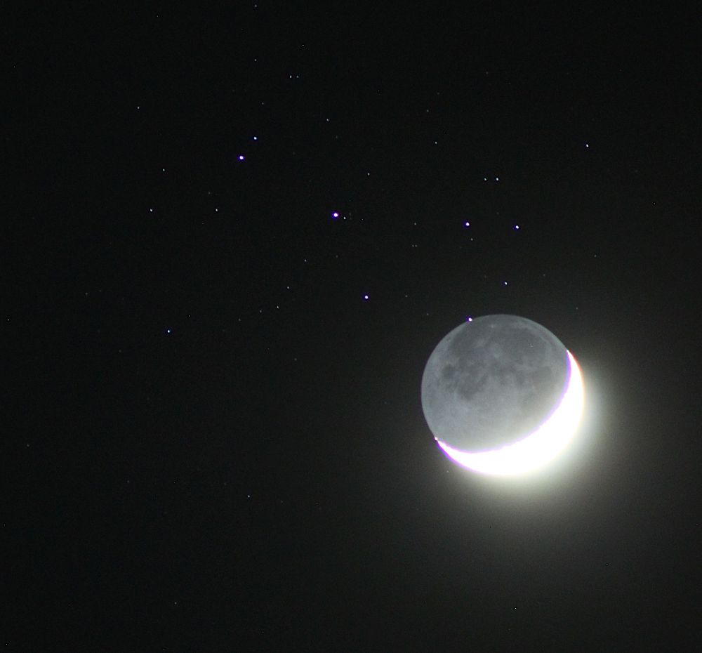 The Moon at waxing crescent phase about to cover a bright star in the Pleiades star cluster. 