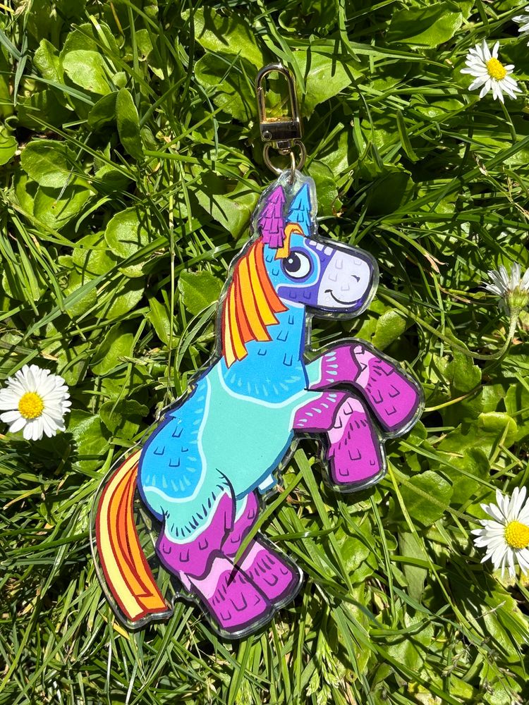 Rear view of the Horstachio charm showcasing the art on the backside. 