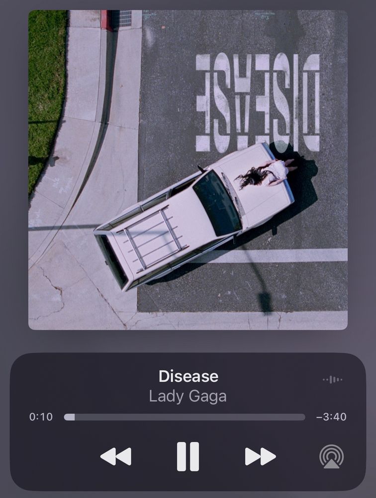 Screenshot of music player on phone: Disease by Lady Gaga