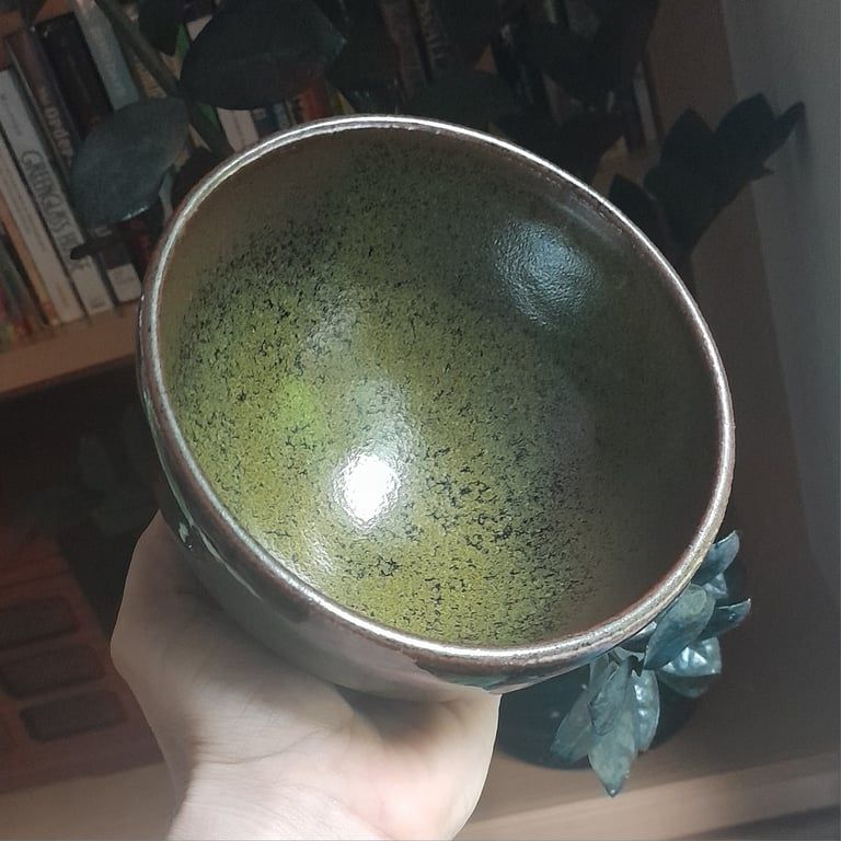 A bowl with a teadust glaze