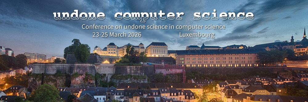 “Undone Computer Science
Conference on undone science in computer science
23-25 March 2025 — Luxembourg”
White text set on a background picture: a photograph entitled “Dusk in Luxembourg Grund” by Tristan Schmurr, CC BY 2.0