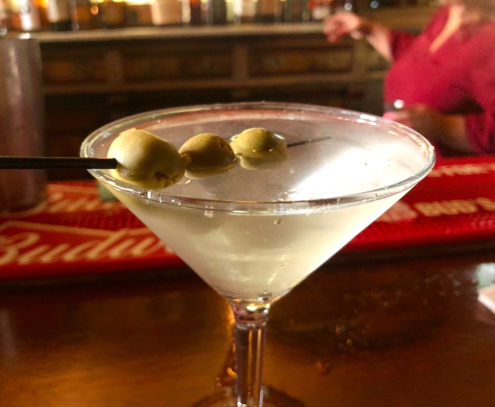 classic dirty martini with 3 olives