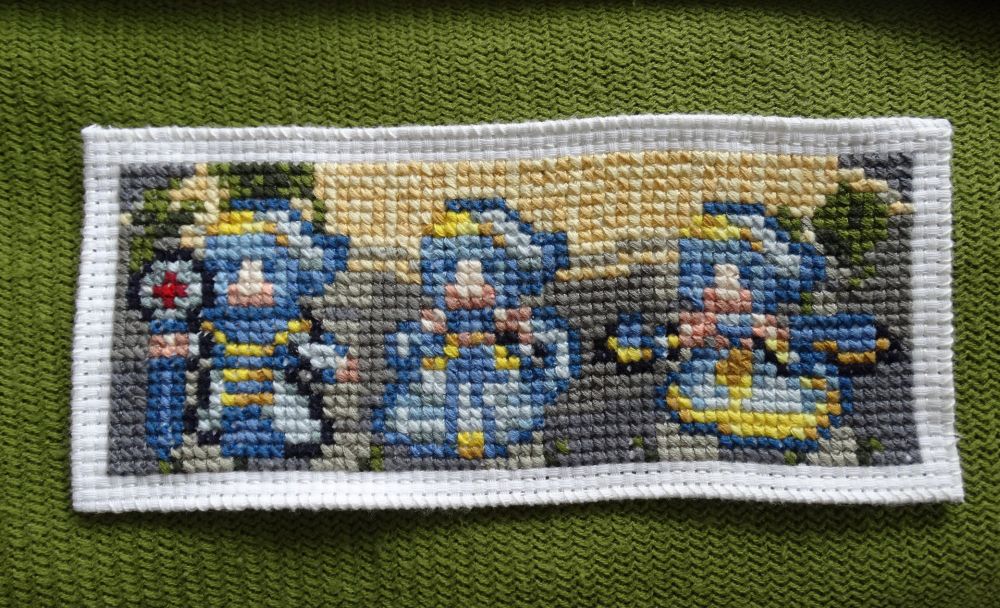 Cross-stitch embroidery of Silque from Fire Emblem Echoes: Shadows of Valentia. It shows three of her sprites - as cleric, saint and exemplar - in a row on top of a simplified background of a Mila shrine.