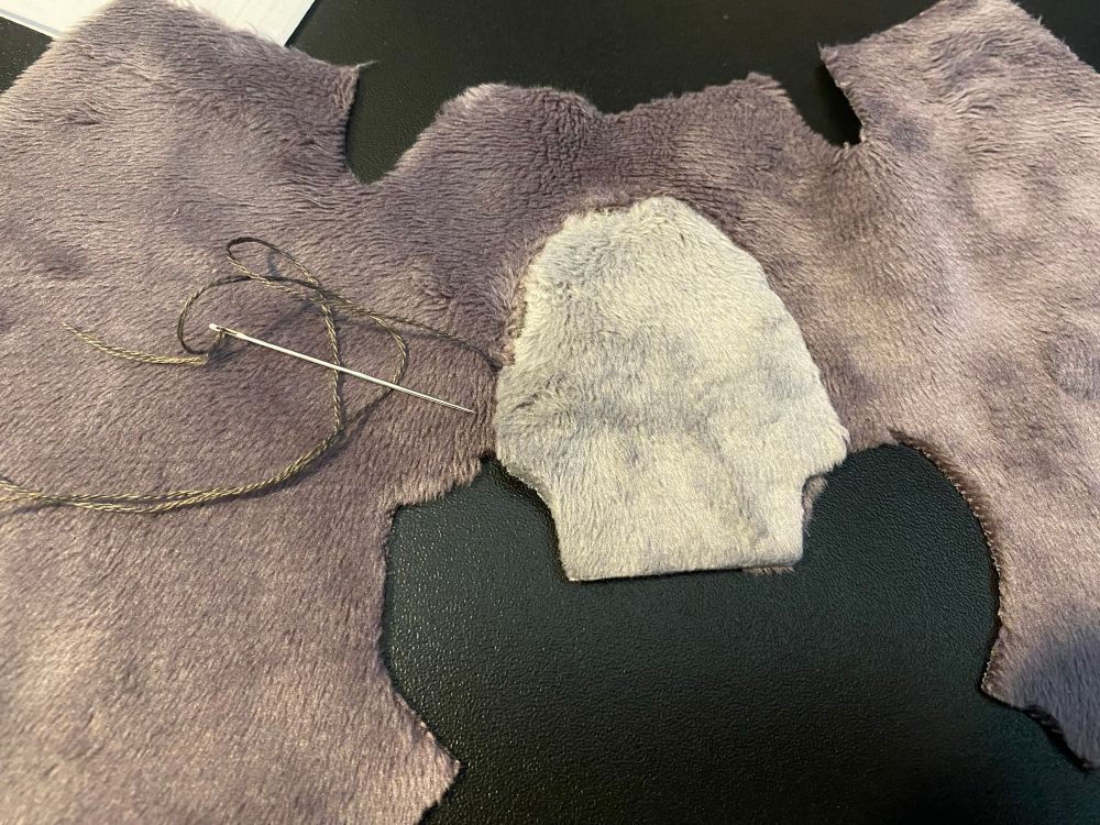 Minky fabric, being stitched onto another piece of minky.