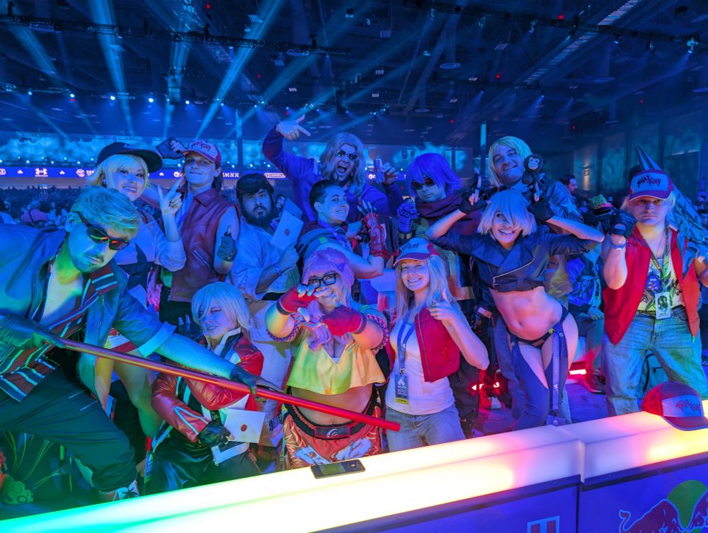 SNK and Fatal Fury cosplayers posing in Red Bull Best Seats section at EVO2025