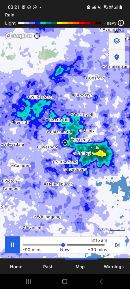 A weather map, with a pin on my home,  completely covered with heavy tropical rain,  but we don't live anywhere near the topics. 