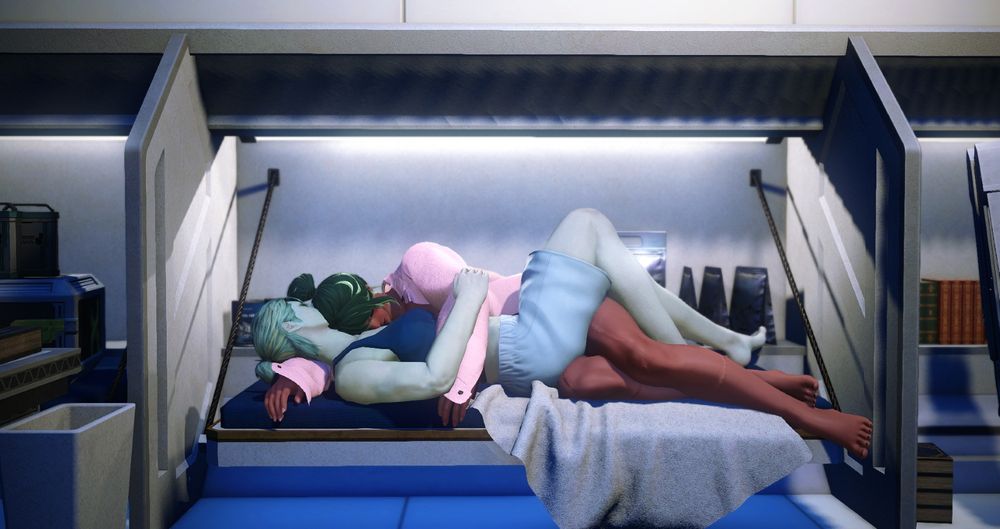 Two femroes are cuddled together in a cramped spaceship bunk, one dressed in a blue tank and shorts and the other in an oversized pink shirt and purple shorts. The brown-skinned one is now behind her girlfriend, face tucked into her shoulder. Her long legs are hanging off the side and folded a little, while her green-skinned girlfriend is cradled, knees over knees. 