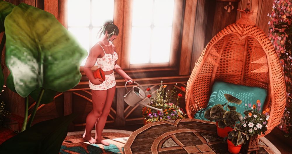 A Hellsguard Roegadyn woman is shown watering her plants in a sunlit cabin-like apartment. Bright white light is streaming down from a window behind her. She has an empty clay pot tucked against her hip, and her other hand holds a watering can above a barrel of flowers. In the foreground, you can see some large fanned leaves of another plant. On the table across from a paissa chair, there are various potted plants and flowers. She's dressed in white and red jammies.