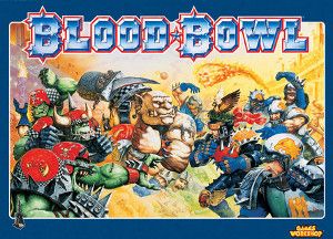 A picture of the box of the board game “Blood Bowl” which depicts a Tolkein-esque fantasy of orcs and an ogre versus humans in a game of American style football