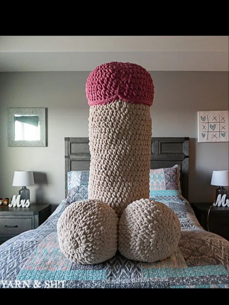 A gigantic penis, made of yarn