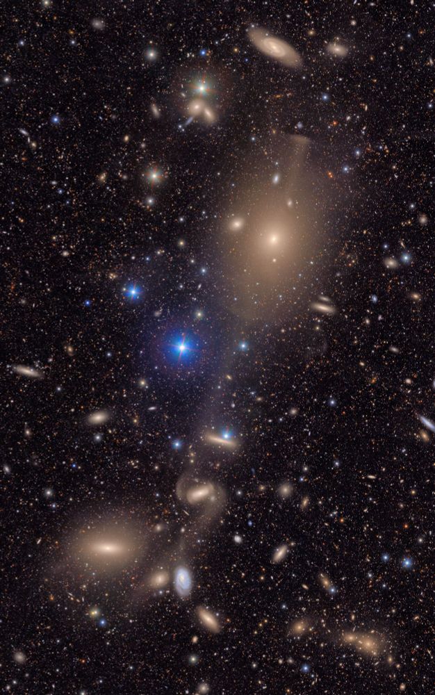 This image shows a small section of NSF-DOE Vera C. Rubin Observatory's total view of the Virgo cluster. Bright stars in the Milky Way galaxy shine in the foreground, and many distant galaxies are in the background.