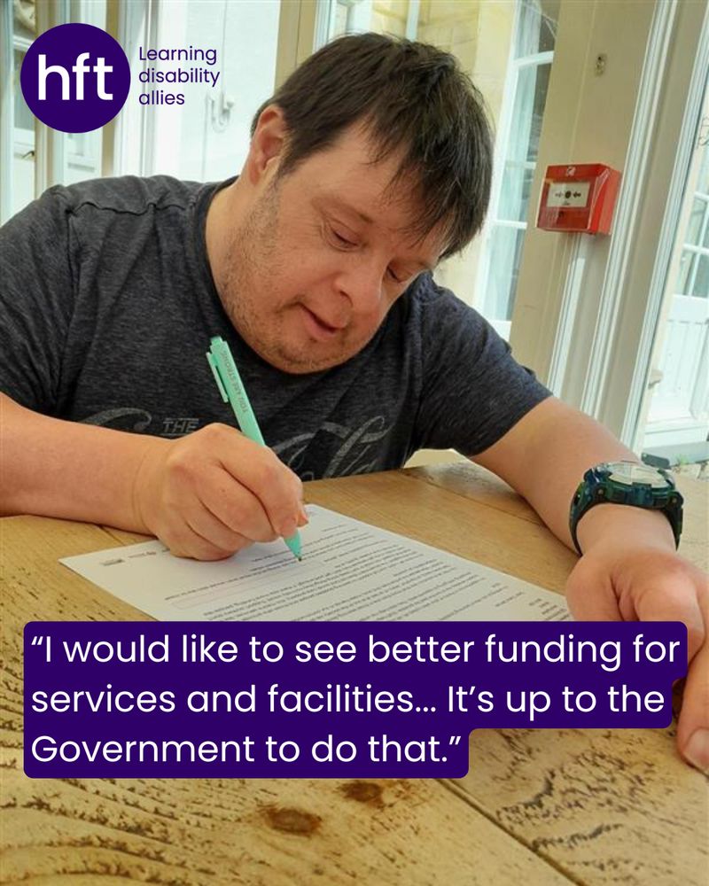 Paul signs his letter at a table. A quote from him reads: "I would like to see better funding for services and facilities... It's up to the Government to do that."