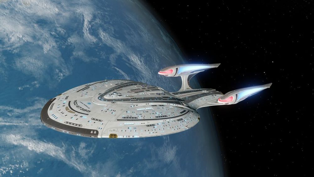 Odyssey class starship from Star Trek flying in orbit of an Earth like planet.