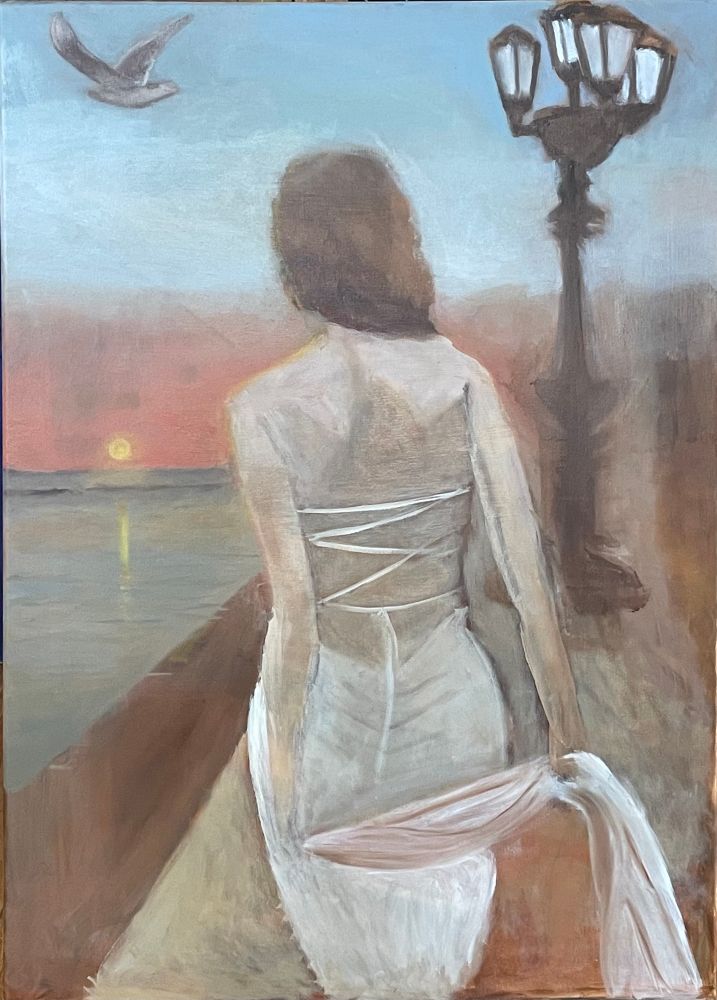 Woman in backless dress on Bari lungomare