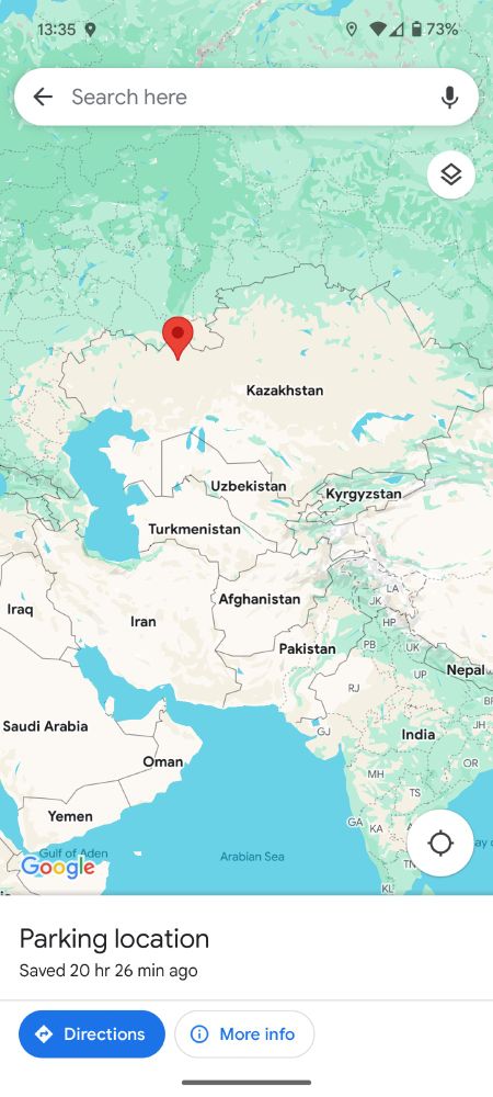 Screenshot of Google Maps showing an automatically added parking location in Kazakhstan.