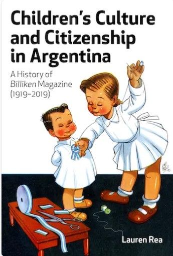 Illustrated book cover titled *“Children’s Culture and Citizenship in Argentina: A History of Billiken Magazine (1919–2019)” by Lauren Rea. The cover features two cartoon-style children in white outfits; an older girl pins a blue ribbon onto a younger boy. A red table with stationery sits beside them.