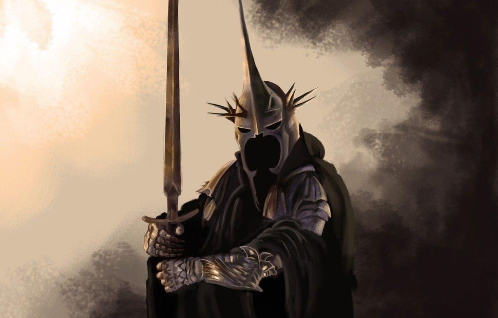 The Witch King of Angmar in black robes and armour, holding his longsword aloft with both hands. His spiked helmet with darkness where his face should be, has descending cheek guard parts that ensure he can't look over his shoulder, so he's very easy to overtake or sneak up on 😉