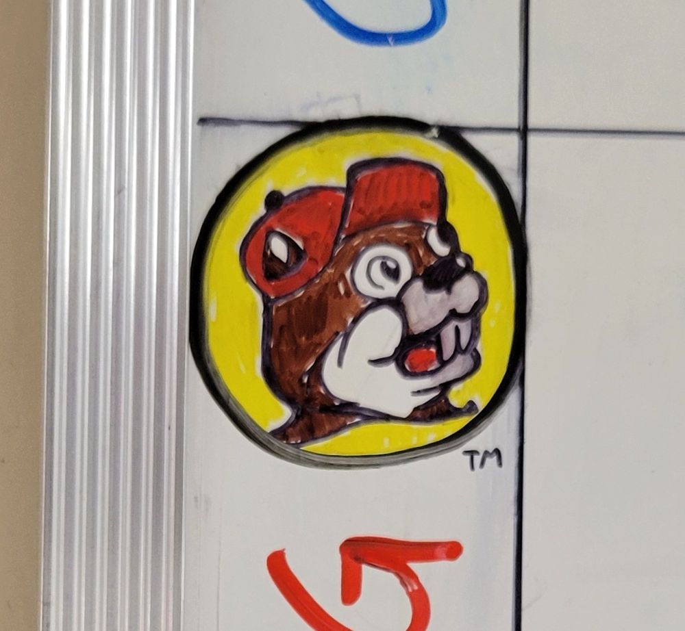 a horrifying dry-erase sketch representation of the Bucc-ee beaver(?) thing