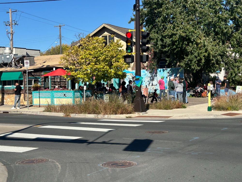 Waiting crowd at Victors on 38th and Grand for lunch