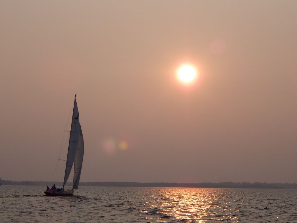 Eagle 38 sailboat sails away into the sunset