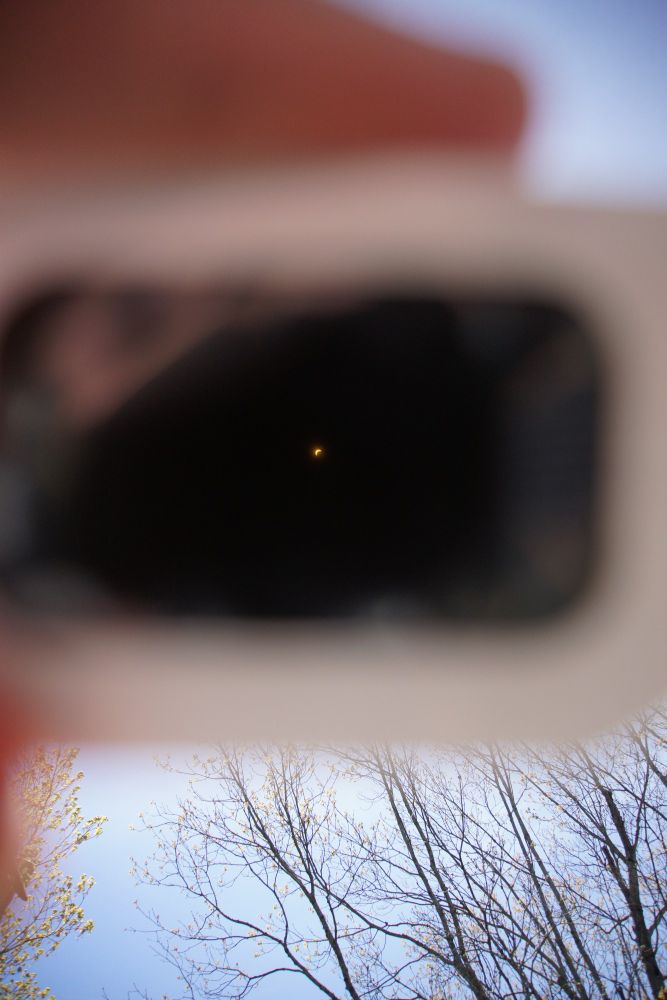 beforehand through eclipse glasses