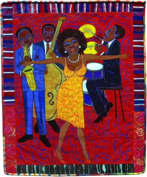 photo of quilt art, Jazz Stories: Mama Can Sing, Papa Can Blow #1: Somebody Stole My Broken Heart, 2004. a woman in a yellow dress sings before a band consisting of a horn player, a bass player, and a drummer.