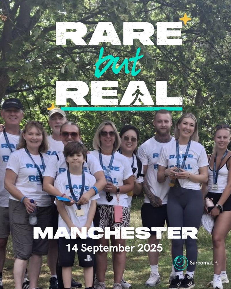 Image shows a group of people made up of adults and children in a park wearing 'Rare but Real' t-shirts. Text reads 'Rare but Real Manchester 14 September'