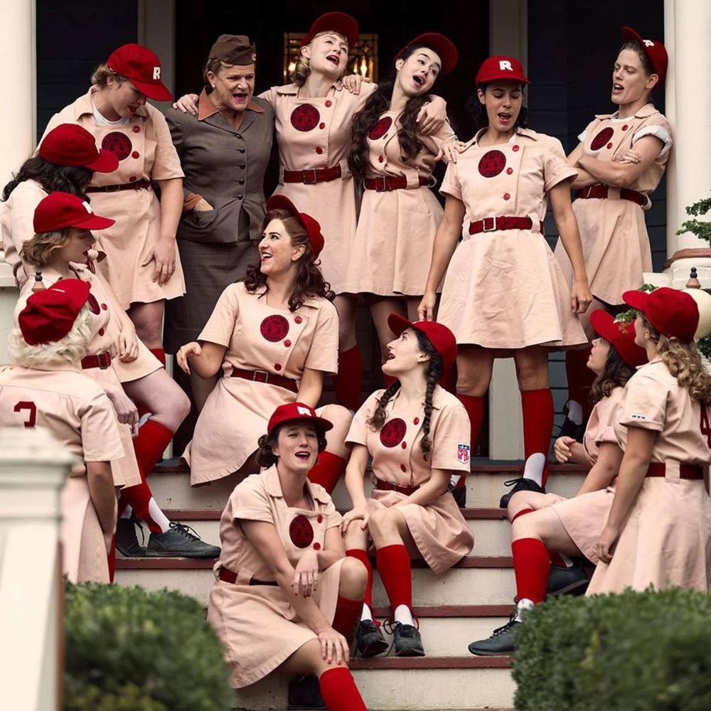 A group shot of the Rockford Peaches from A League of Their Own (2022).