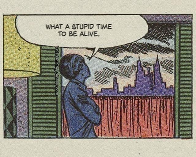 A woman looking out a window at a city skyline in the distance and saying: "What a stupid time to be alive"