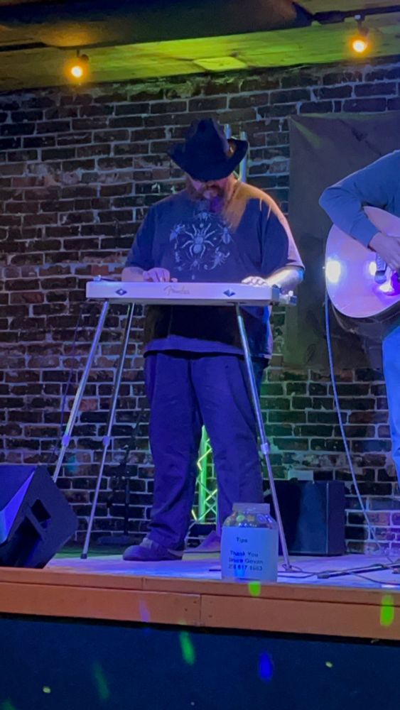 Me again! Playing steel guitar and looking sexier than I have any right to. 