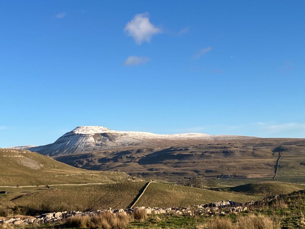 Ingleborough Hill wearing a cap of snow at 3.00pm this afternoon. 