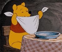 Winnie the Pooh getting ready for a meal