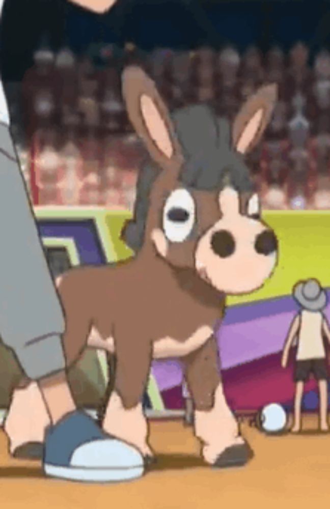 a cartoon donkey is standing next to a person 's feet .