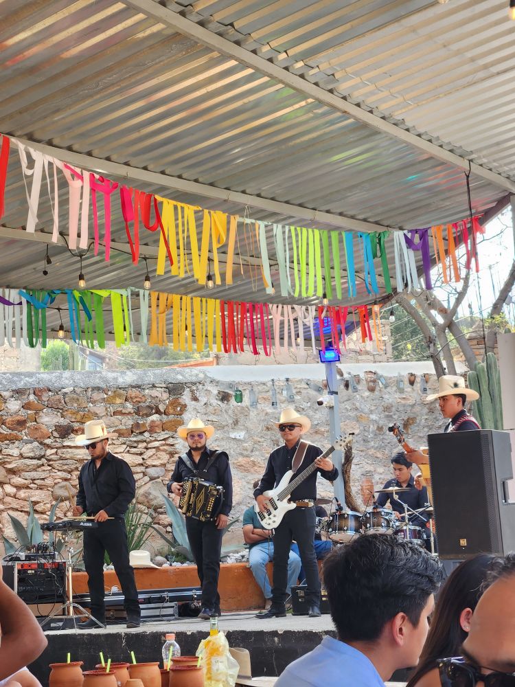 Mexican band playing on a stage