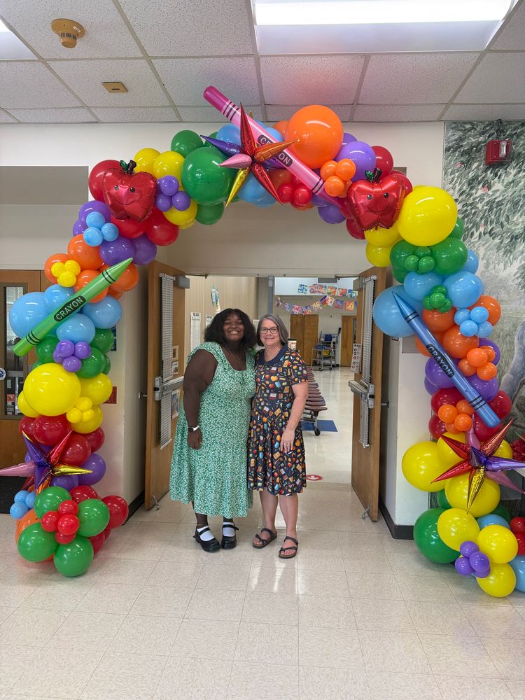 Teacher and intern at open house 