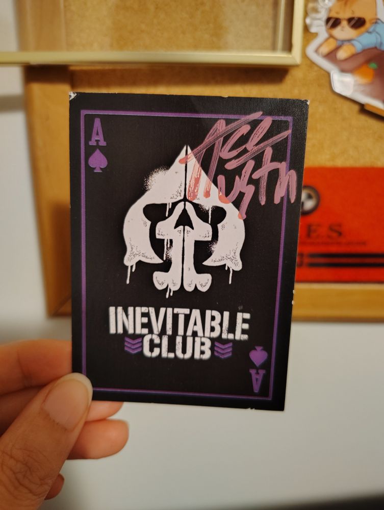 an ace austin playing card, signed by ace austin in purple marker