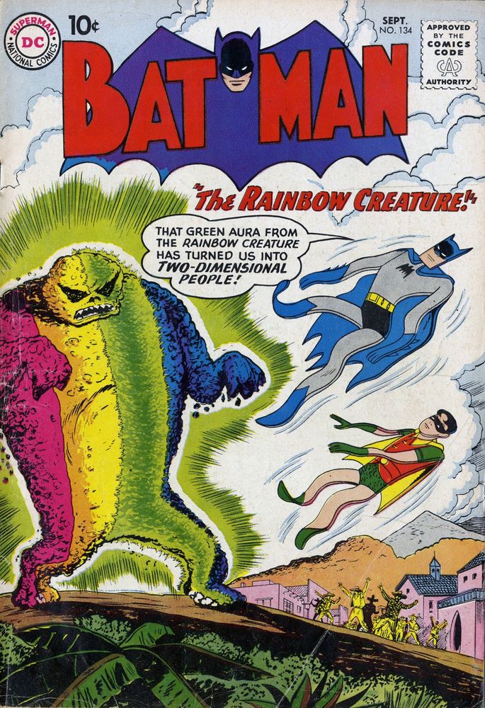 A giant rainbow colored monster that is glowing green energy. Batman and Robin are standing in front of it, but have been transformed into two dimensional versions of themselves.

Yes, Batman and Robin are always two dimensional because they are comic book characters. However, the art is cleverly drawn to make the distinction clear that they exist within three dimensions in the fiction of the comic.