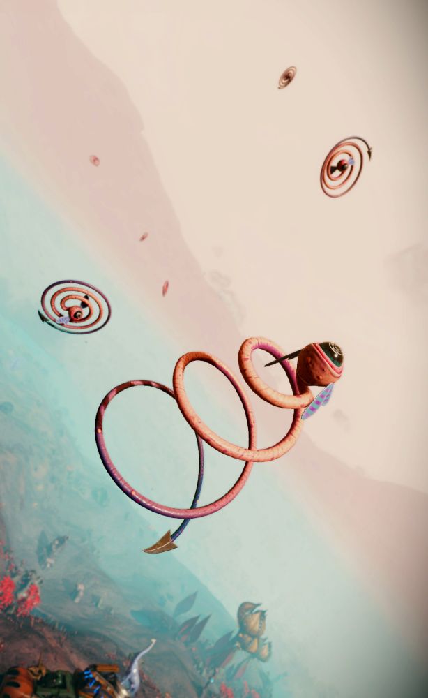 Some spirally spinny boys that look like they're from Okage. They have a single eyeball at the center with small polka dotted wing ears and a devil tail. I love this dude look at him