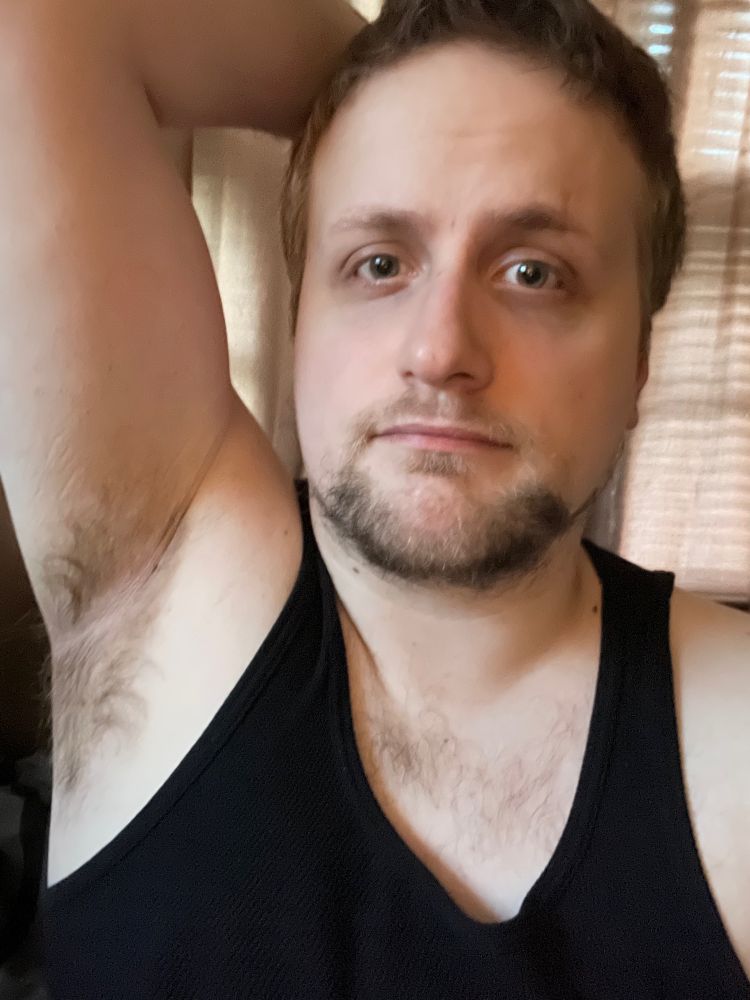 Selfie with my arm up, exposing my armpit