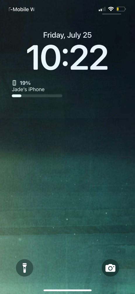 iPhone lock screen with a green gradient background