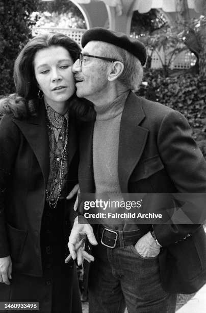 Groucho kisses Erin Fleming. "Our relationship is purely physical," he joked.