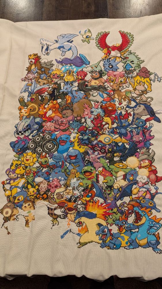 Pokemon Generation 2 rendered in a cross-stitch embroidery collage, missing five in the bottom right corner.