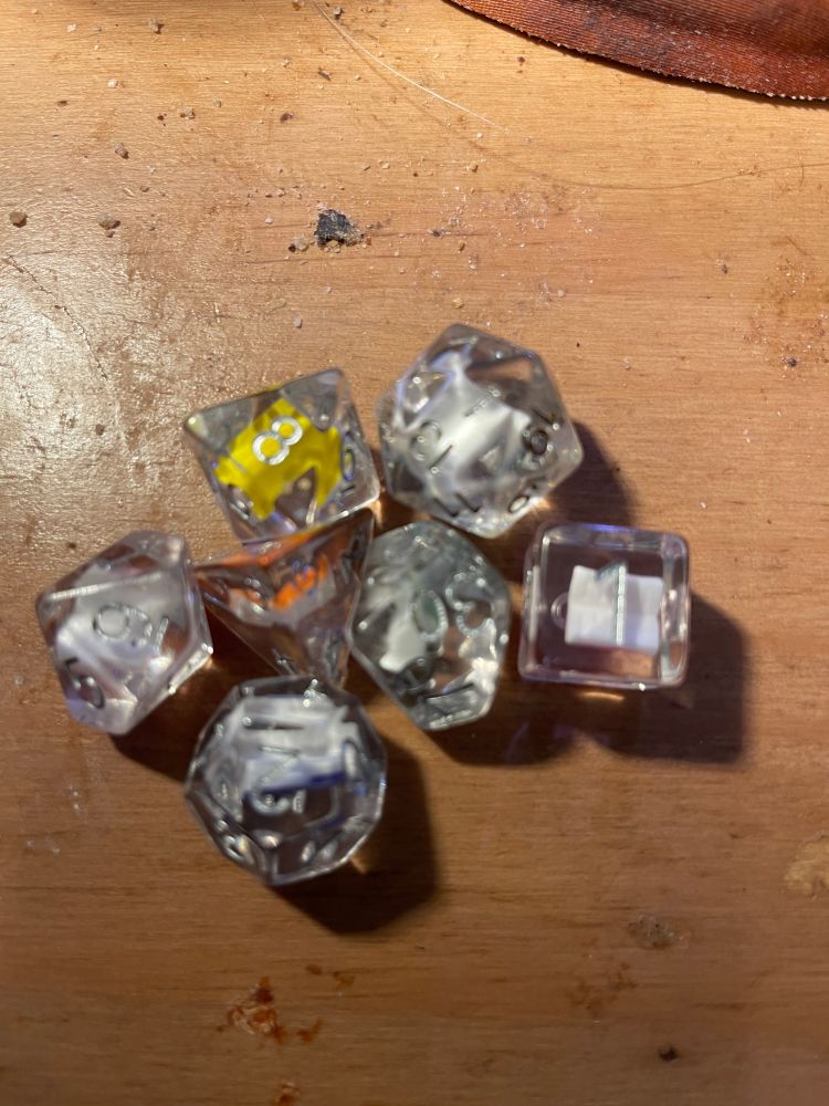 Book Infused Dice by FanRoll. They have little books in them. Morroyo is a Summoner/Scholar main.