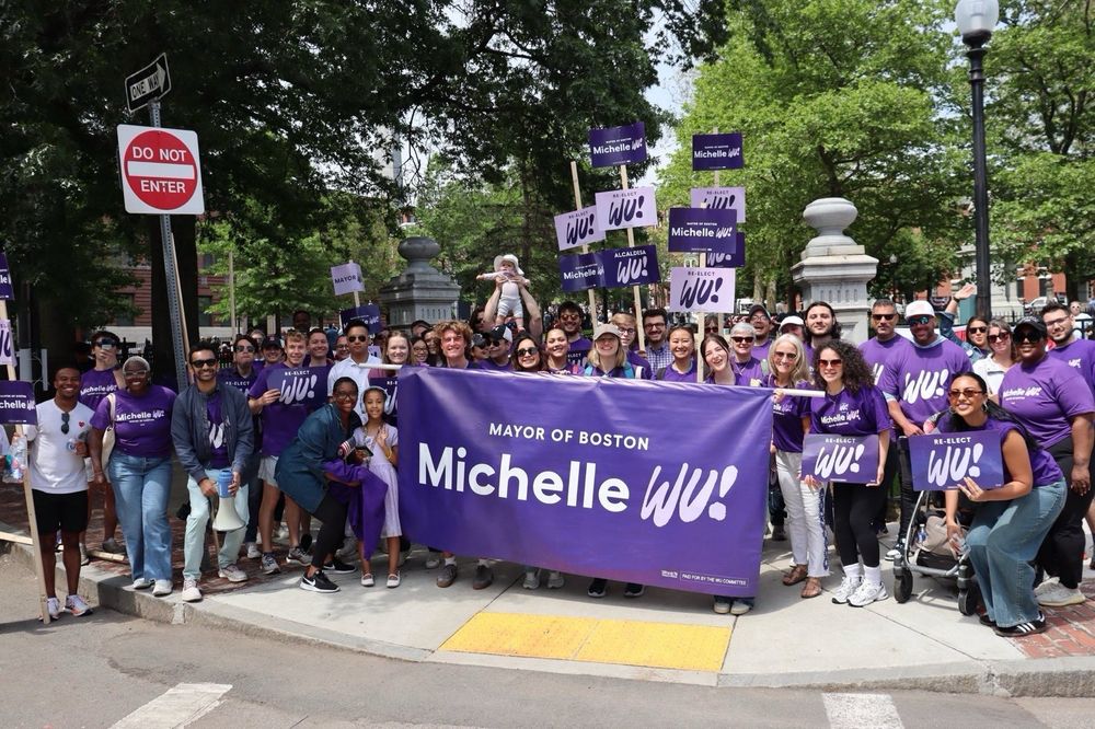 Mayor Michelle Wu campaign team at bunker hill parade. 